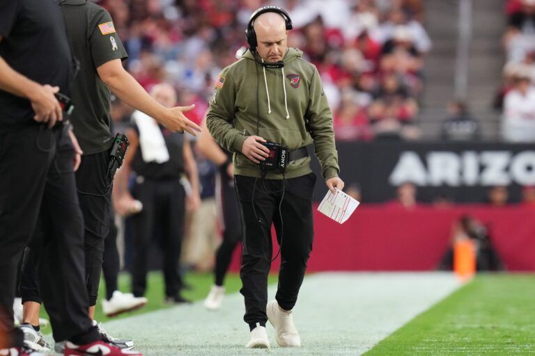 Arizona Cardinals offensive coordinator Drew Petzing walks the sidelines as they play the San Francisco 49ers at State Farm Stadium in Glendale on Nov. 16, 2025.