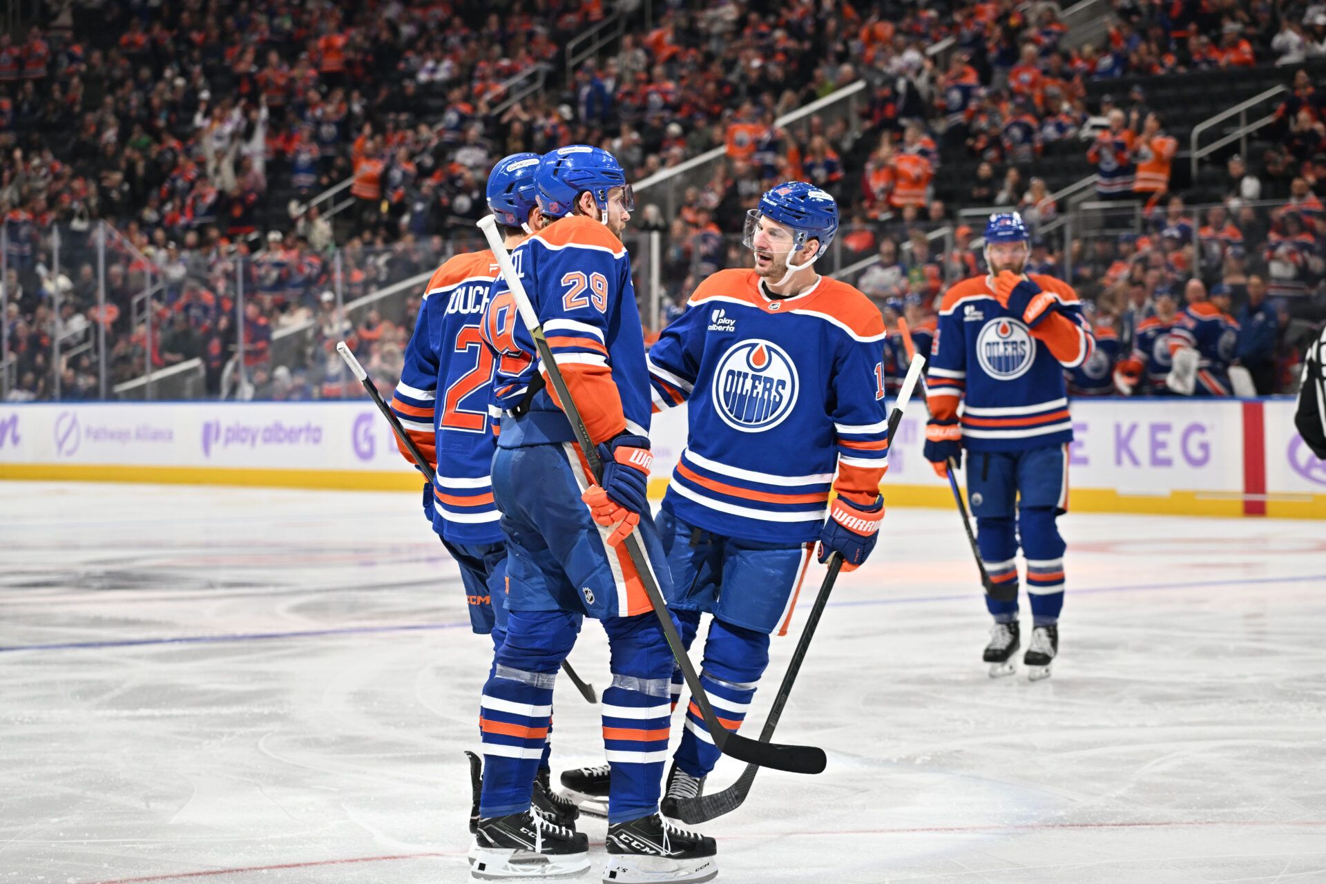 Edmonton Oilers centre Leon Draisaitl (29) and Oilers left winger Zach Hyman (18) celebrate a goal on the Dallas Stars during the third period at Rogers Place.