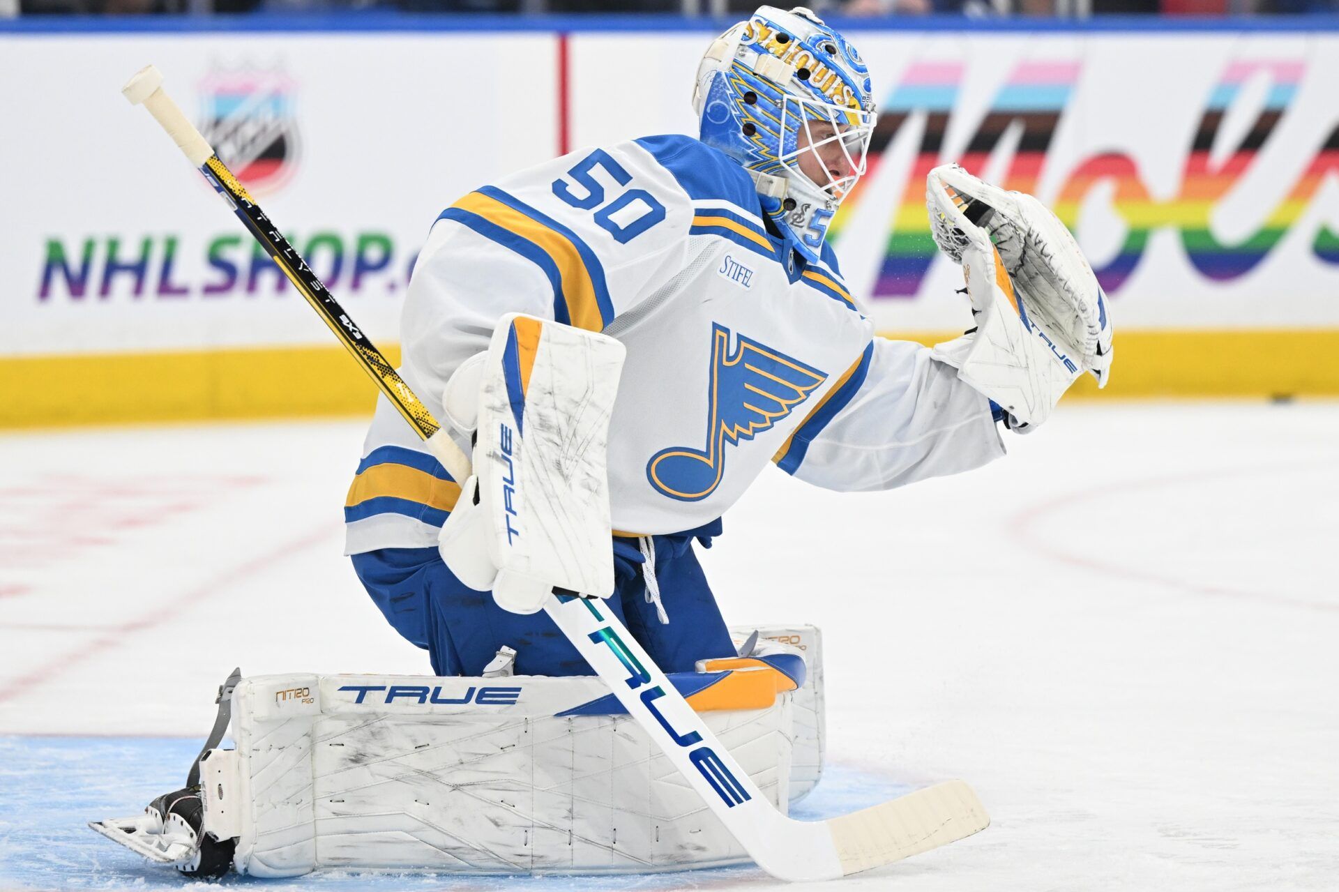 St. Louis Blues goalie Jordan Binnington (50) makes a glove save as he warms up before playing the Toronto Maple Leafs at Scotiabank Arena.