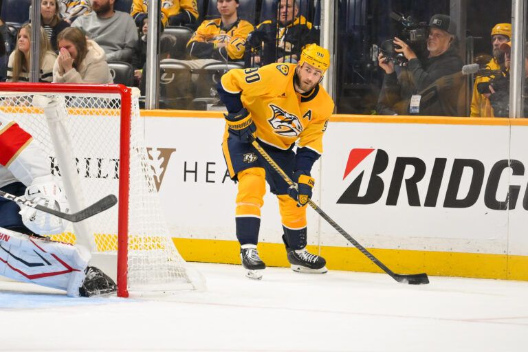 Nashville Predators center Ryan O'Reilly (90) skates behind the net against the Florida Panthers during the third period at Bridgestone Arena.