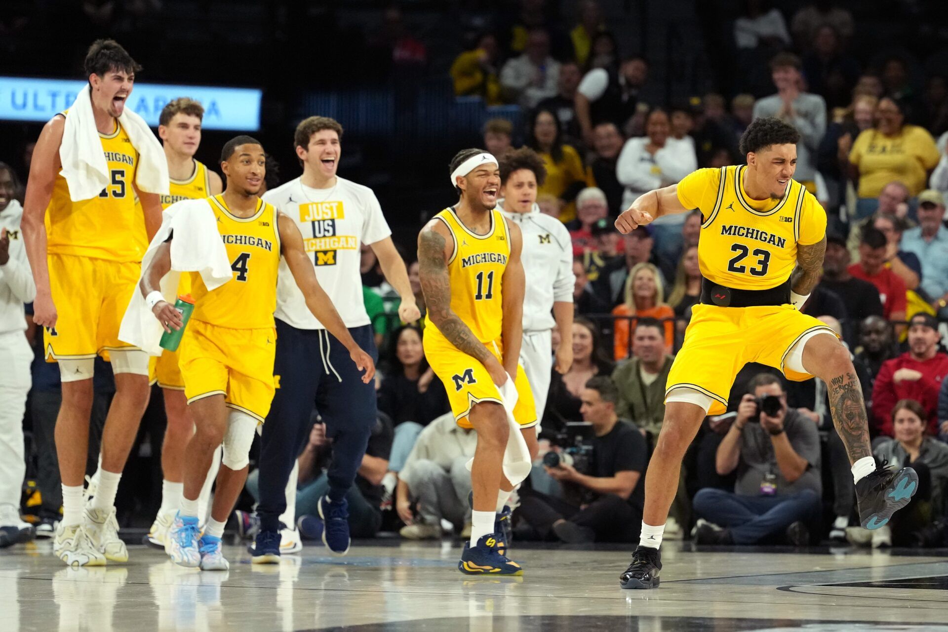 Michigan Wolverines forward Yaxel Lendeborg (23) reacts during the second half in a 2025 Players Era Festival group play game against the Auburn Tigers at Michelob ULTRA Arena.