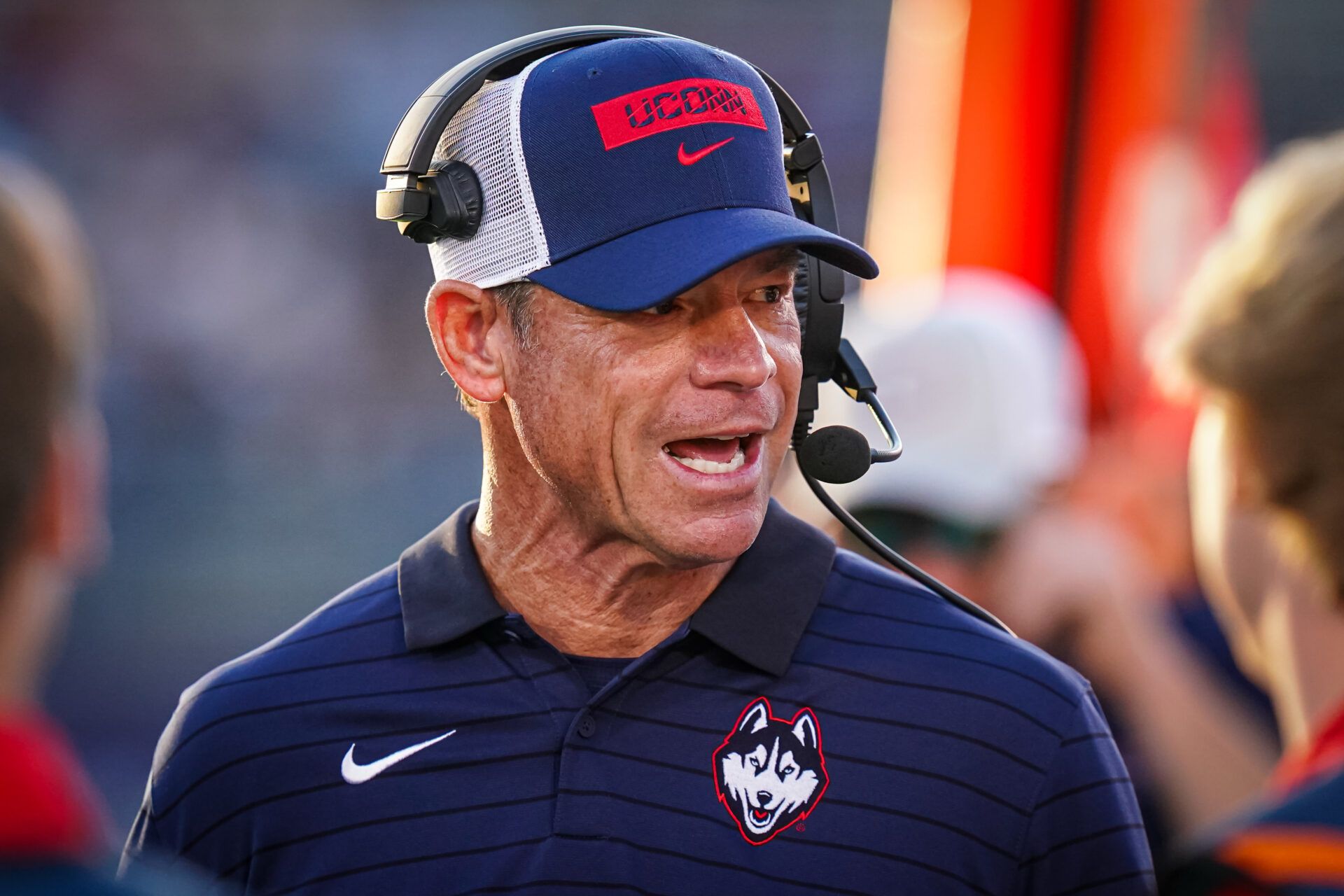 Connecticut Huskies head coach Jim Mora watches from the sideline as they take on the Ball State Cardinals at Pratt & Whitney Stadium at Rentschler Field.