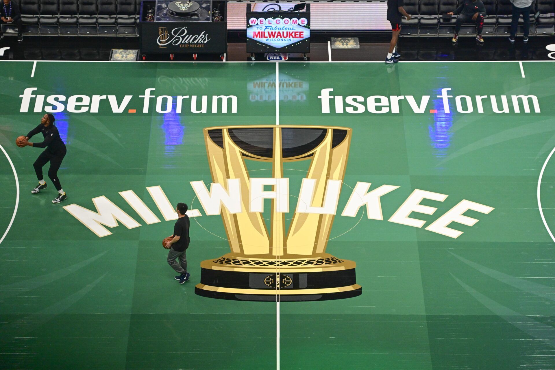 Players warm up before NBA Cup game between the Milwaukee Bucks and Chicago Bulls at Fiserv Forum.