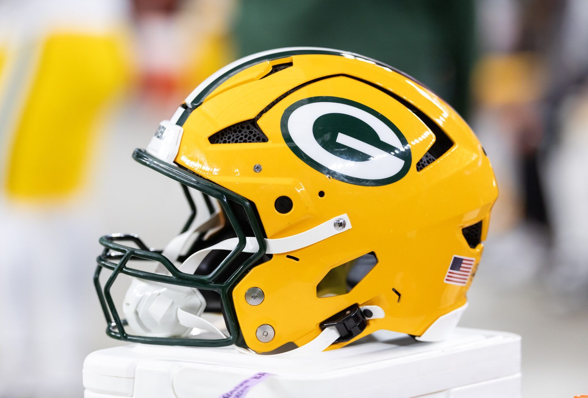 Detailed view of a Green Bay Packers helmet at State Farm Stadium.