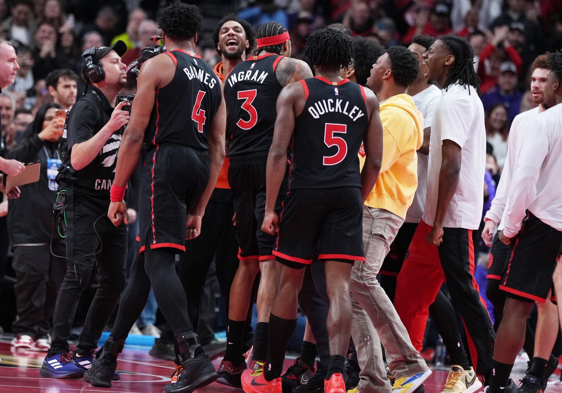 Toronto Raptors forward Brandon Ingram (3) celebrates with his teammates after scoring the winning basket with 0.6 seconds on the clock against the Indiana Pacers during the fourth quarter at Scotiabank Arena.