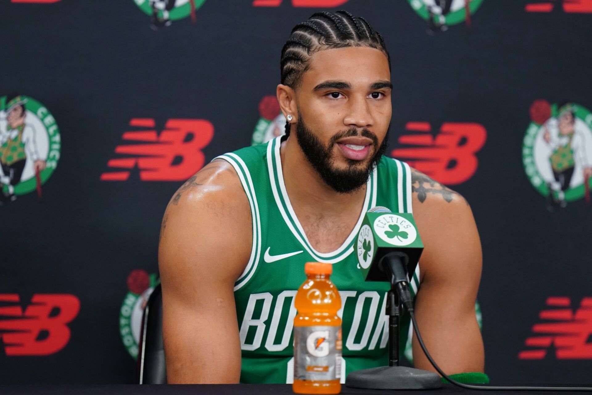 Boston Celtics forward Jayson Tatum (0) talks with reporters during media day at the Auerbach Center.