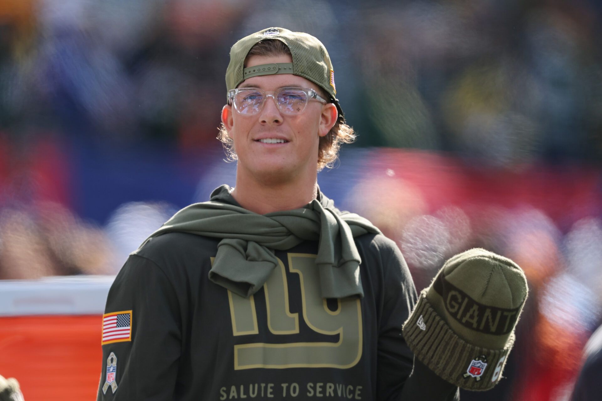 New York Giants quarterback Jaxson Dart (6) looks on before the game against the Green Bay Packers at MetLife Stadium.