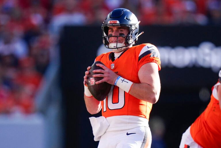 Denver Broncos quarterback Bo Nix (10) looks to pass during the first quarter of the game against the Kansas City Chiefs at Empower Field at Mile High.