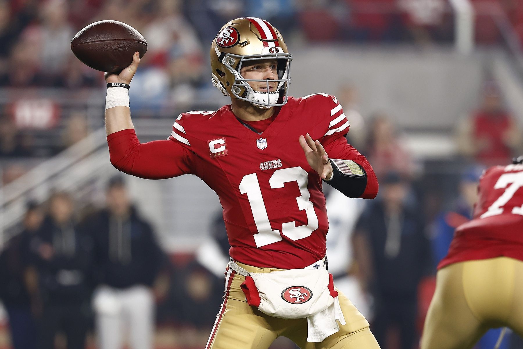 San Francisco 49ers quarterback Brock Purdy (13) drops back to pass against the Carolina Panthers during the first half at Levi's Stadium.