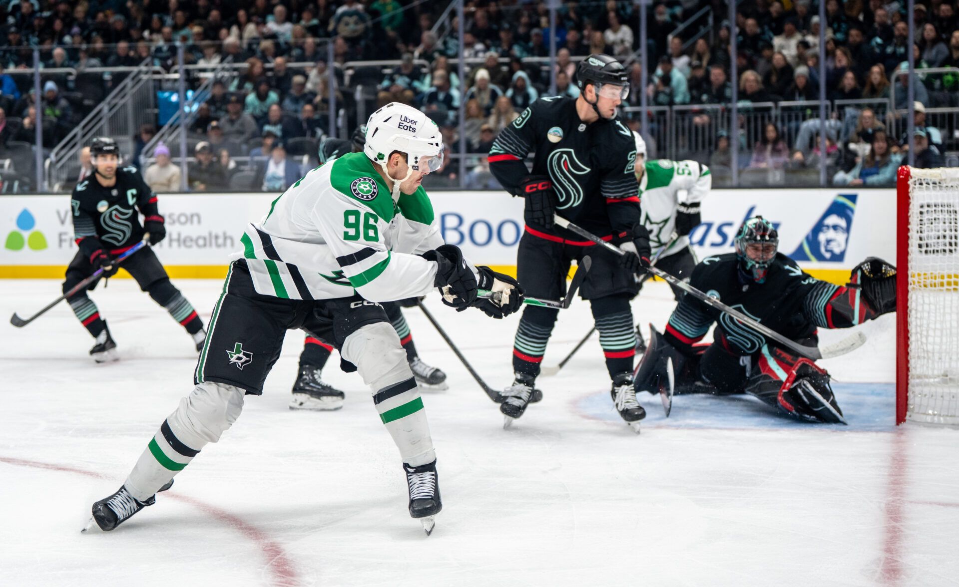 Dallas Stars forward Mikko Rantanen (96) takes a shot against Seattle Kraken goalie Joey Daccord (35), right, during the first period at Climate Pledge Arena.