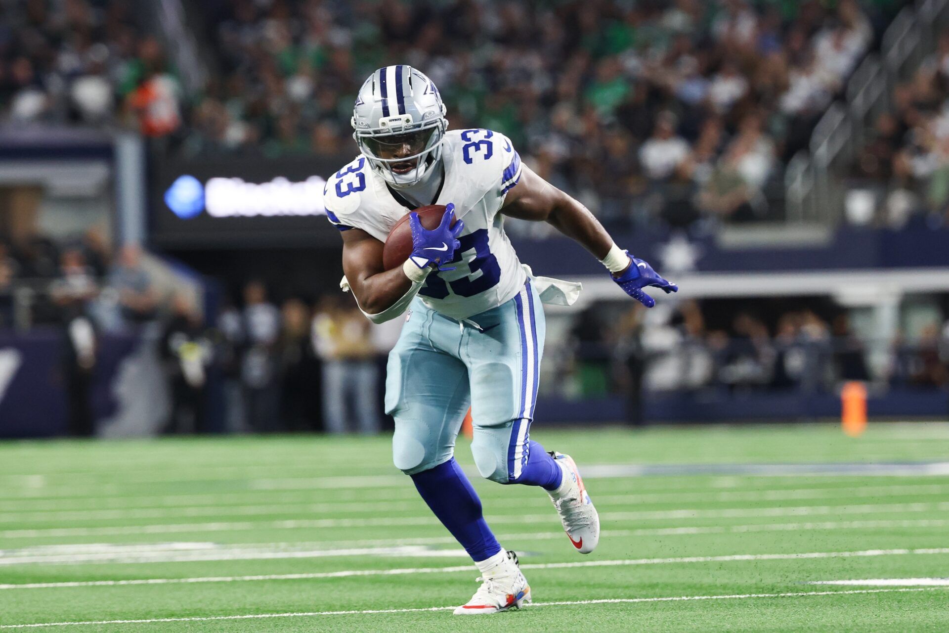 Dallas Cowboys running back Javonte Williams (33) runs with the ball in the second quarter against the Philadelphia Eagles at AT&T Stadium.