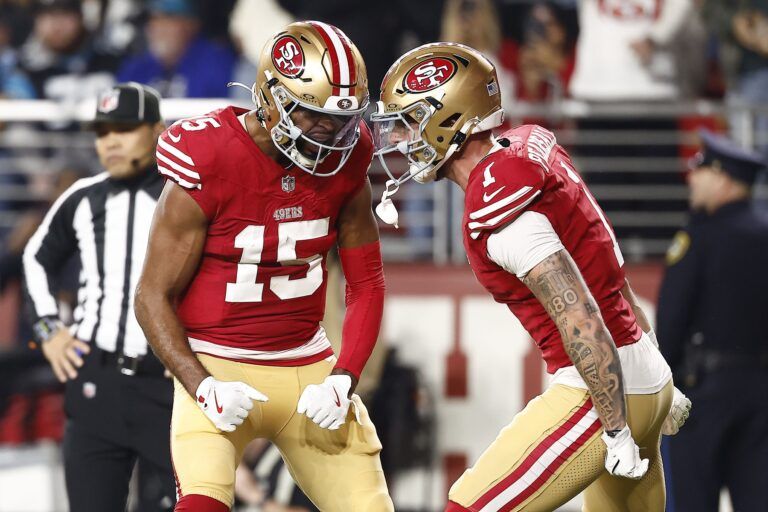 San Francisco 49ers wide receiver Jauan Jennings (15) reacts after scoring a touchdown against the Carolina Panthers during the first half at Levi's Stadium.