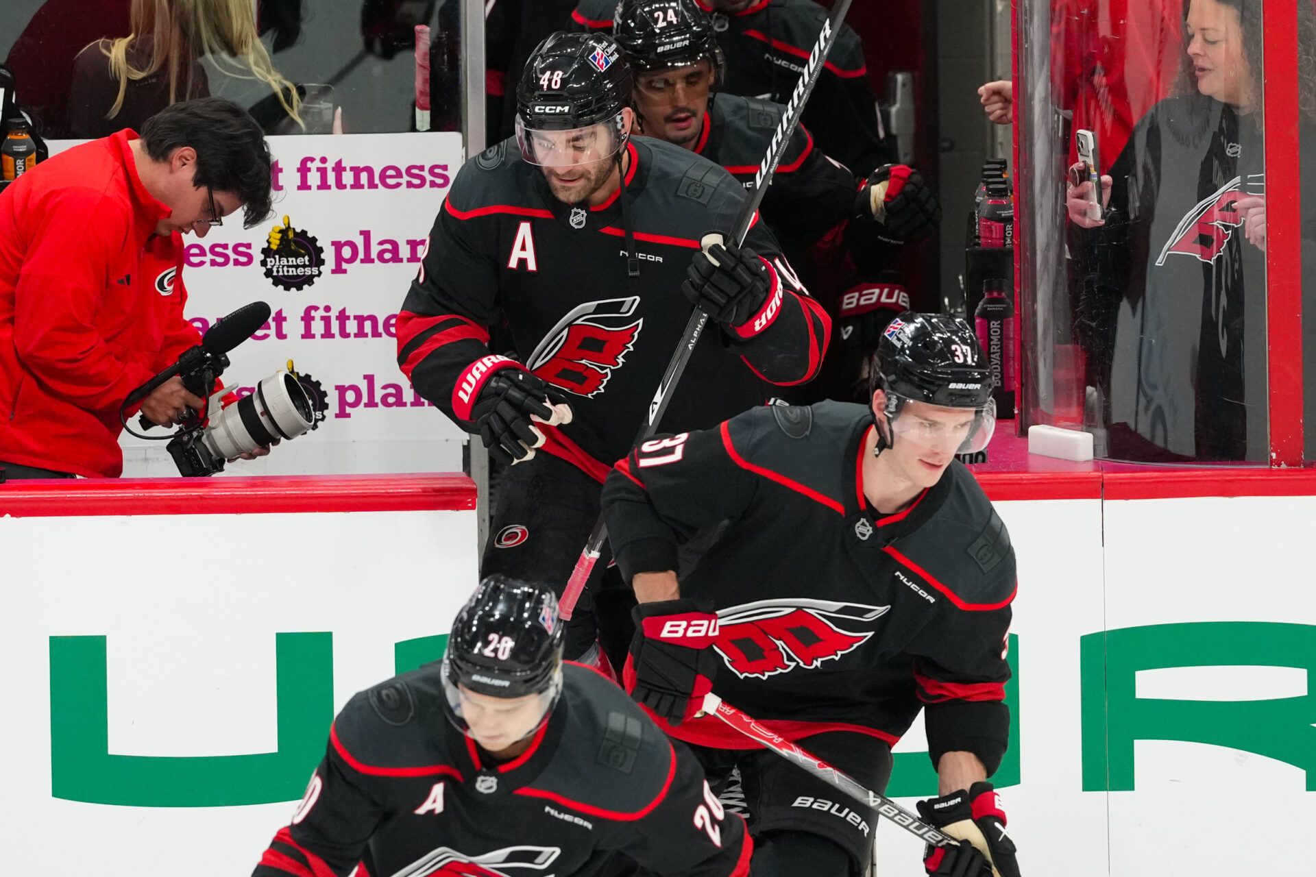 Carolina Hurricanes right wing Andrei Svechnikov (37) and left wing Jordan Martinook (48) come out onto the ice for warmups before the game against the New York Rangers at Lenovo Center.