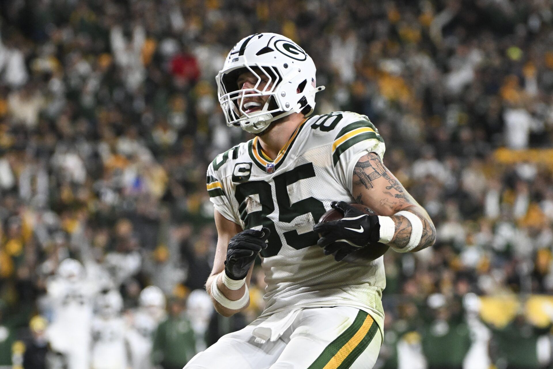 Green Bay Packers tight end Tucker Kraft (85) celebrates his touchdown against the Pittsburgh Steelers during the fourth quarter at Acrisure Stadium.