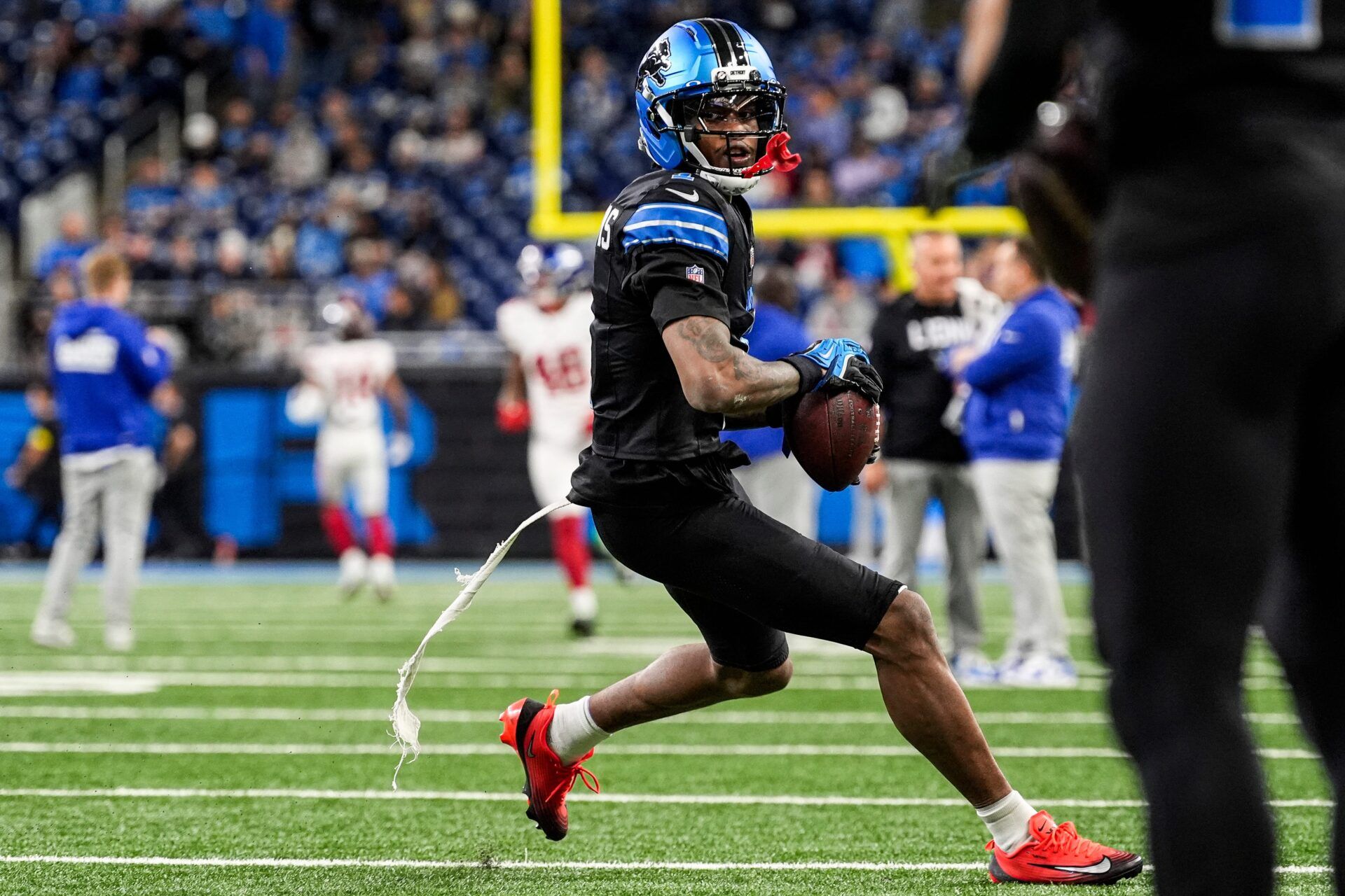 Detroit Lions wide receiver Jameson Williams (1) warms up ahead of the New York Giants game at Ford Field in Detroit on Sunday, Nov. 23, 2025.