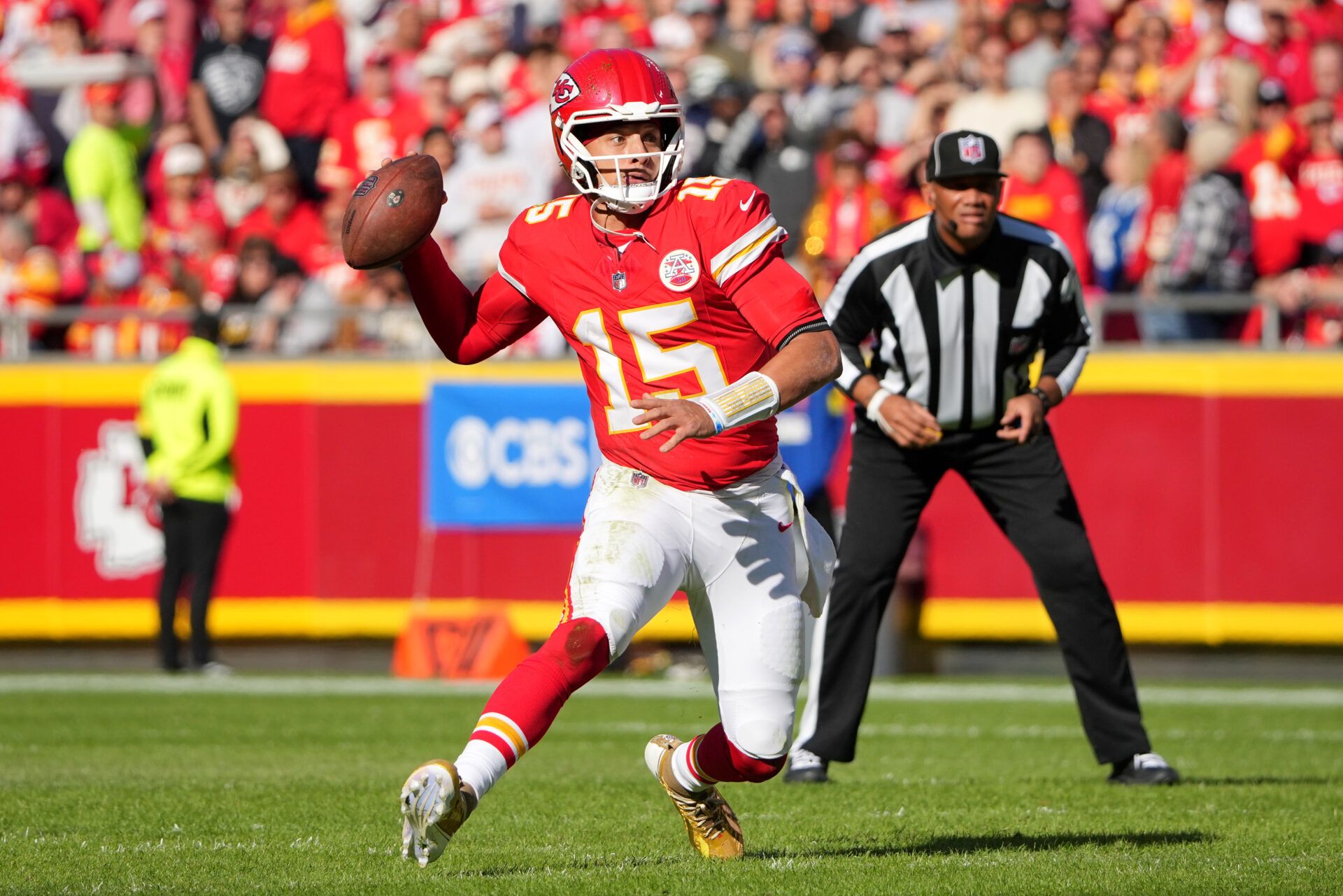 Kansas City Chiefs quarterback Patrick Mahomes (15) looks to pass against the Indianapolis Colts in the second quarter at GEHA Field at Arrowhead Stadium.