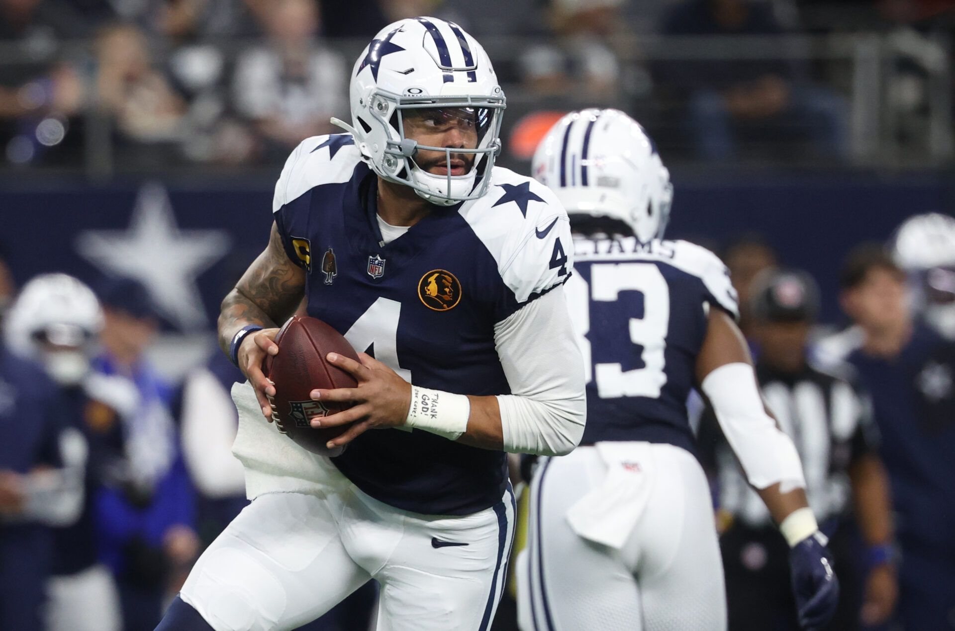 Dallas Cowboys quarterback Dak Prescott (4) looks to throw the ball against the Kansas City Chiefs during the first quarter at AT&T Stadium.