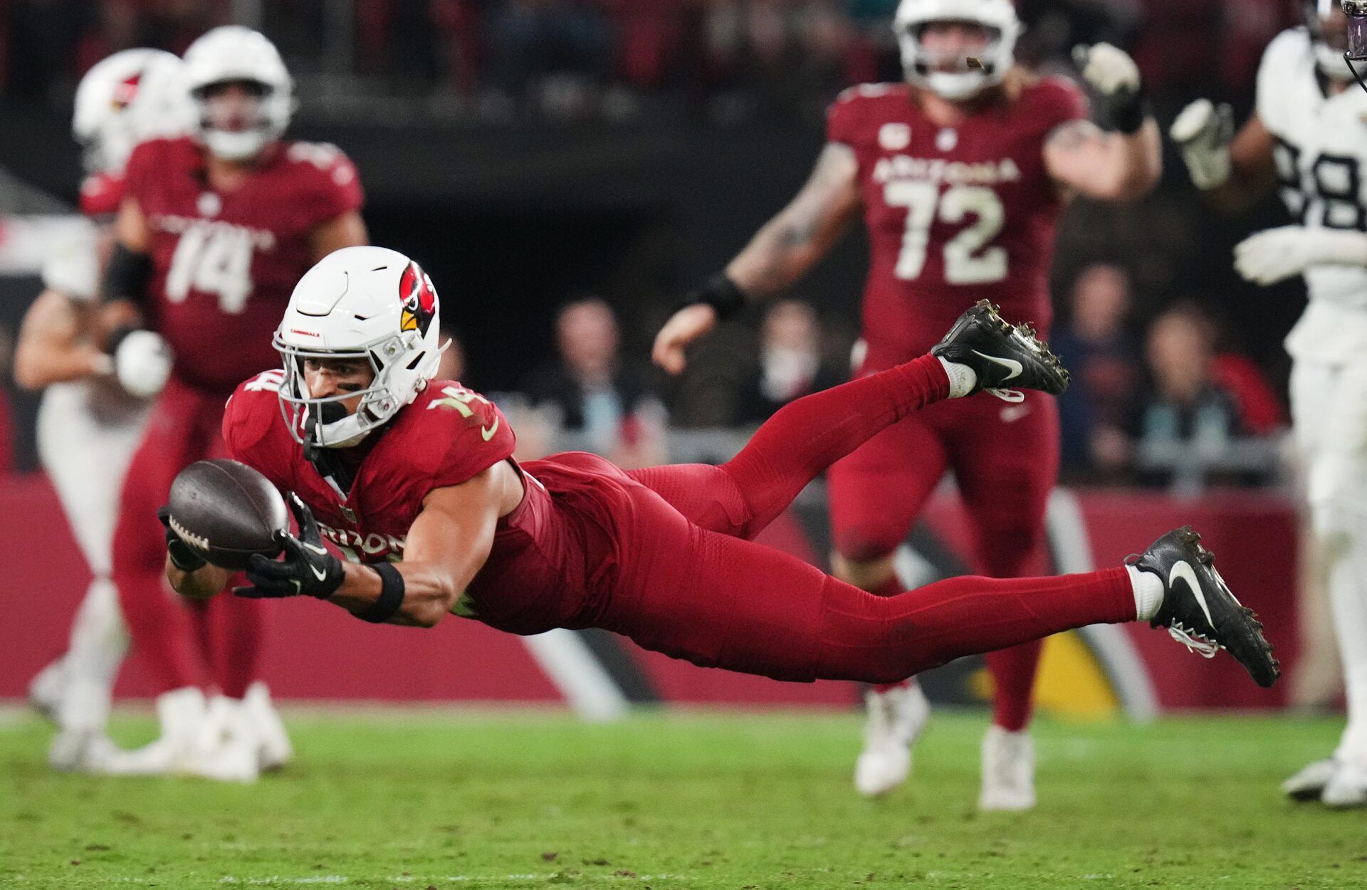 Arizona Cardinals receiver Michael Wilson lays out for a catch, coming up short against the Jacksonville Jaguars at State Farm Stadium on Nov. 23, 2025.