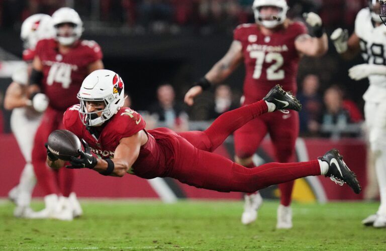 Arizona Cardinals receiver Michael Wilson lays out for a catch, coming up short against the Jacksonville Jaguars at State Farm Stadium on Nov. 23, 2025.