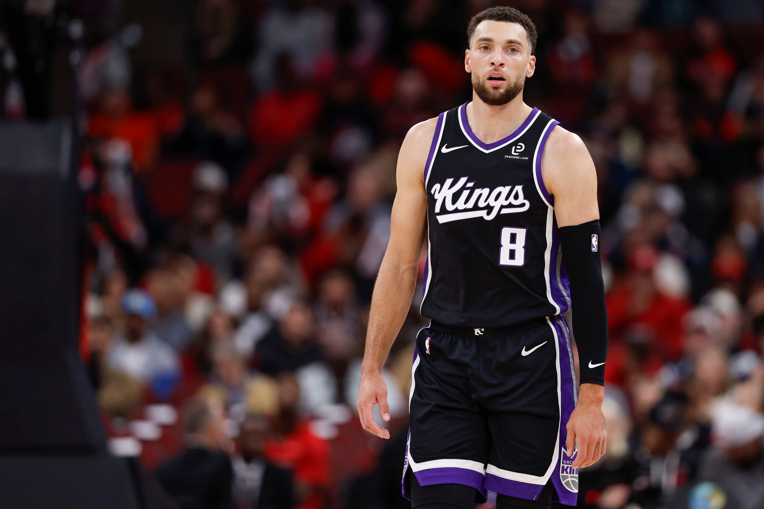 Sacramento Kings guard Zach LaVine (8) walks on the court during the first half at United Center.