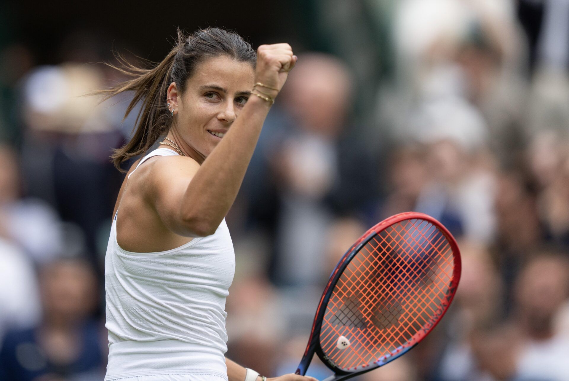 Emma Navarro of the United States celebrates winning her match against Barbora Krejcikova of the Czech Republic on day six at the All England Lawn Tennis and Croquet Club.