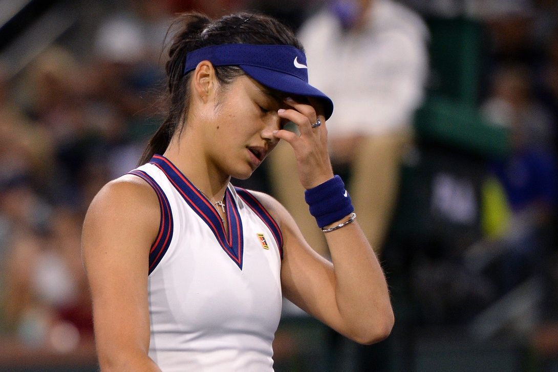 Emma Raducanu (GBR) reacts after losing a point to Aliaksandra Sasnovich (BLR) at Indian Wells Tennis Garden.