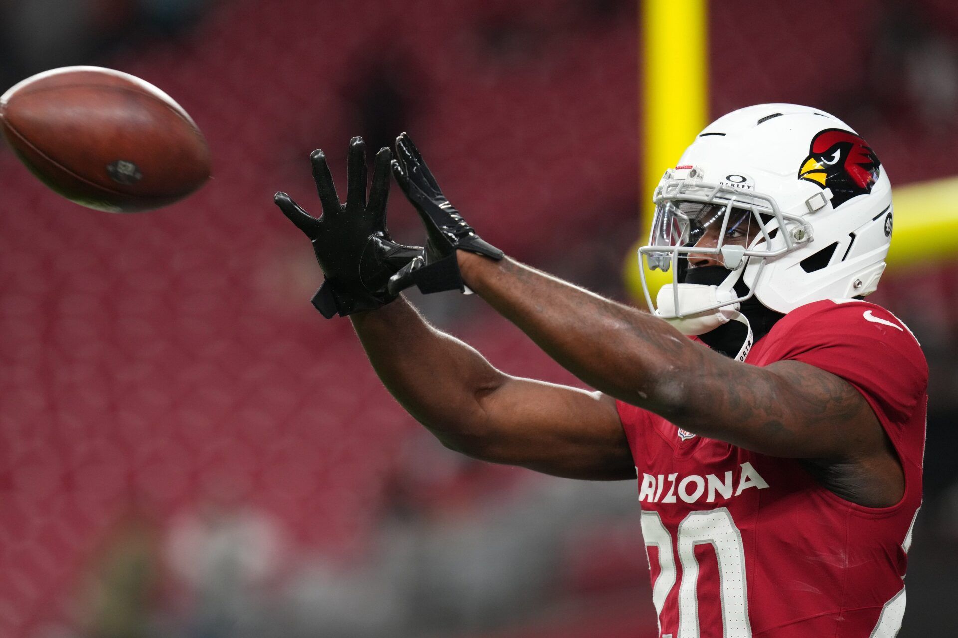 Arizona Cardinals running back Bam Knight (20) warms up before they play the Jacksonville Jaguars at State Farm Stadium on Nov. 23, 2025.