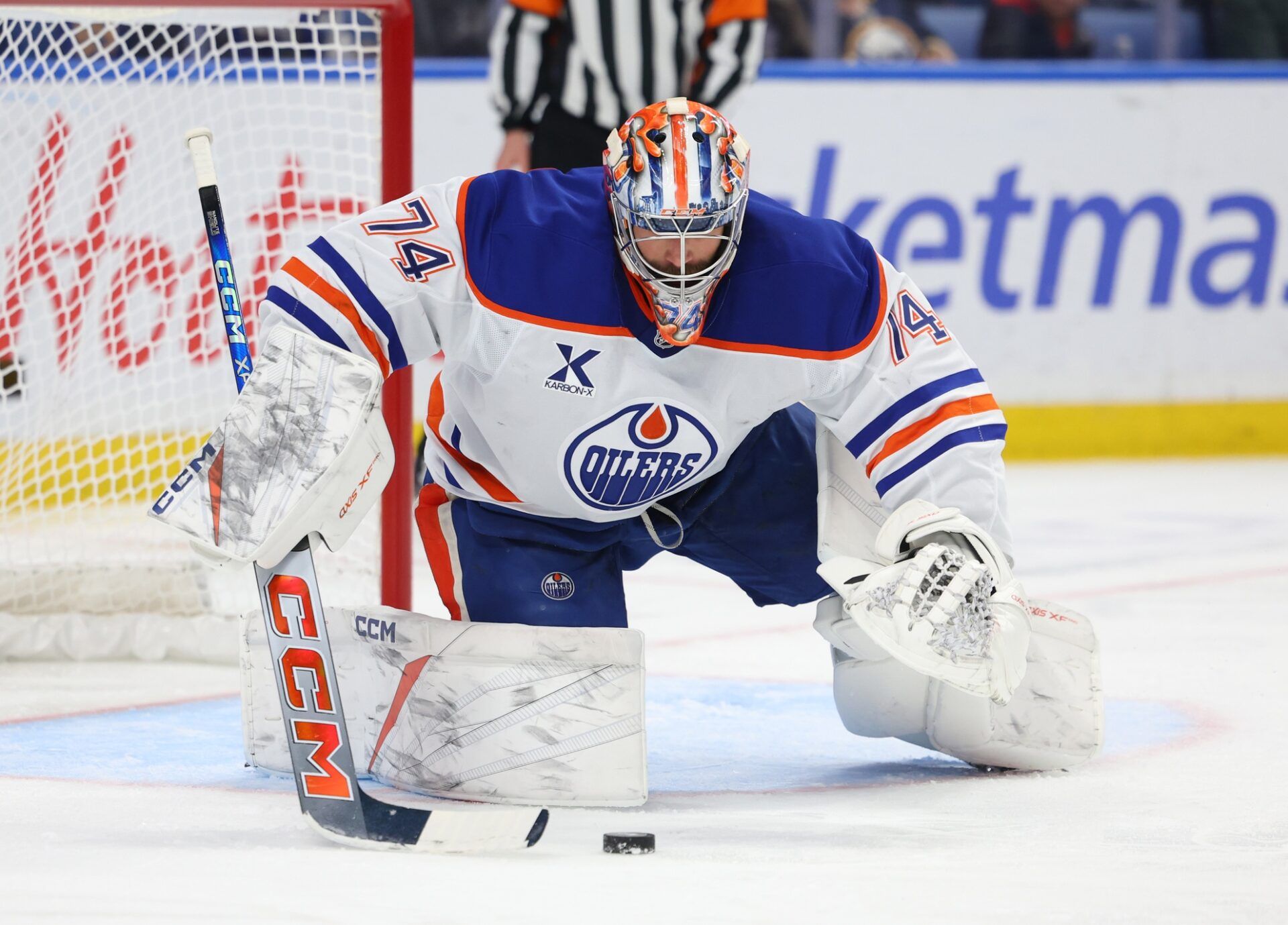 Edmonton Oilers goaltender Stuart Skinner (74) looks to cover ups the puck during the second period against the Buffalo Sabres at KeyBank Center.