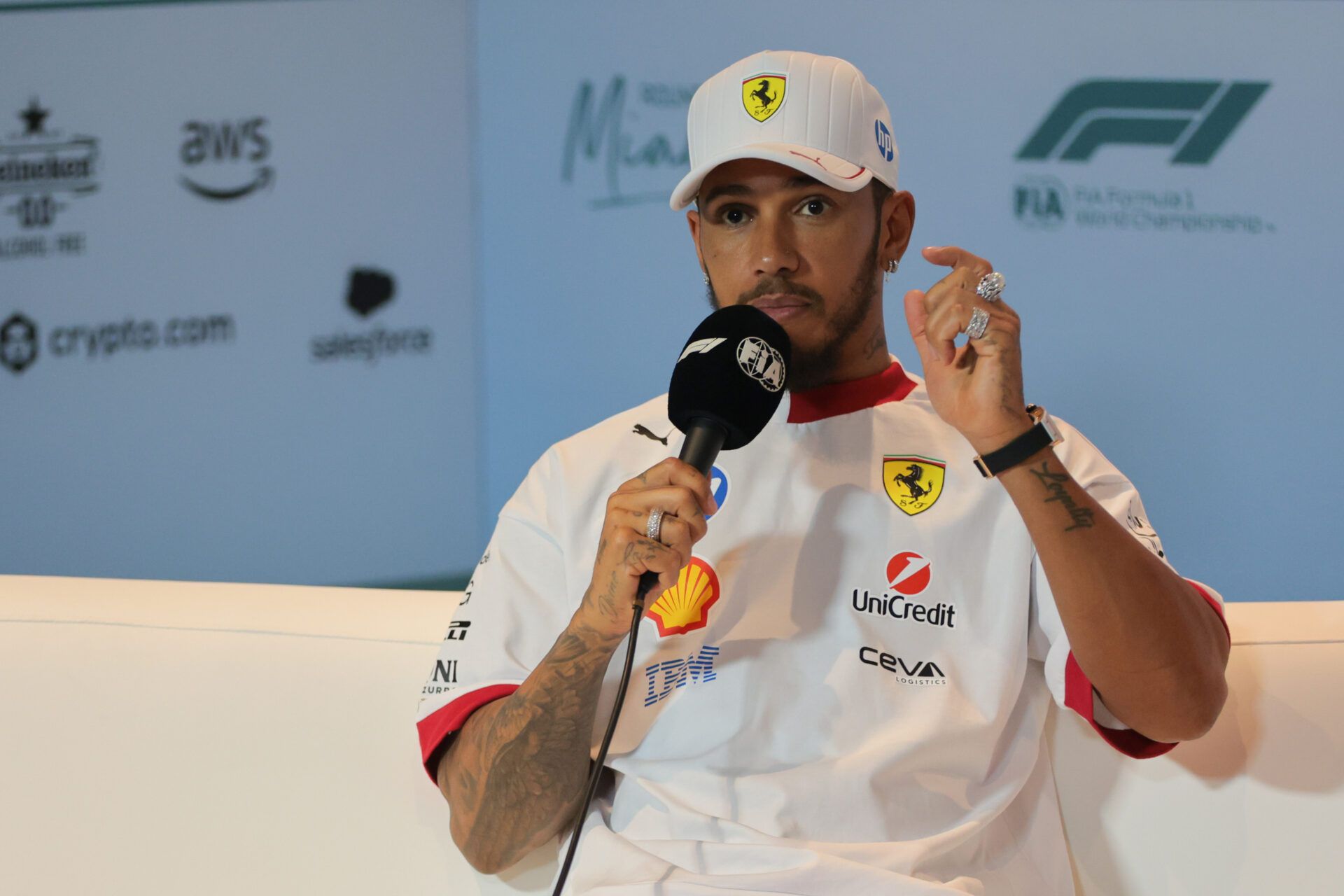 2025; Miami Gardens, FL, USA; Ferrari driver Lewis Hamilton (44) talks to reporters during a press conference at Miami International Autodrome.