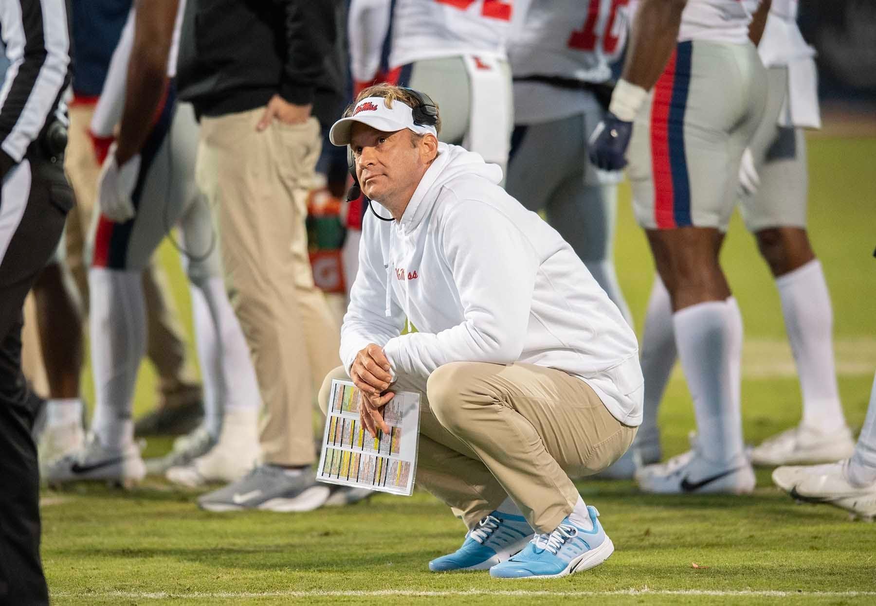 Ole Miss coach Lane Kiffin looks up at the scoreboard during a time out in second half of the Egg Bowl at Davis Wade Stadium in Starkville, Miss., Thursday, Nov. 23, 2023.