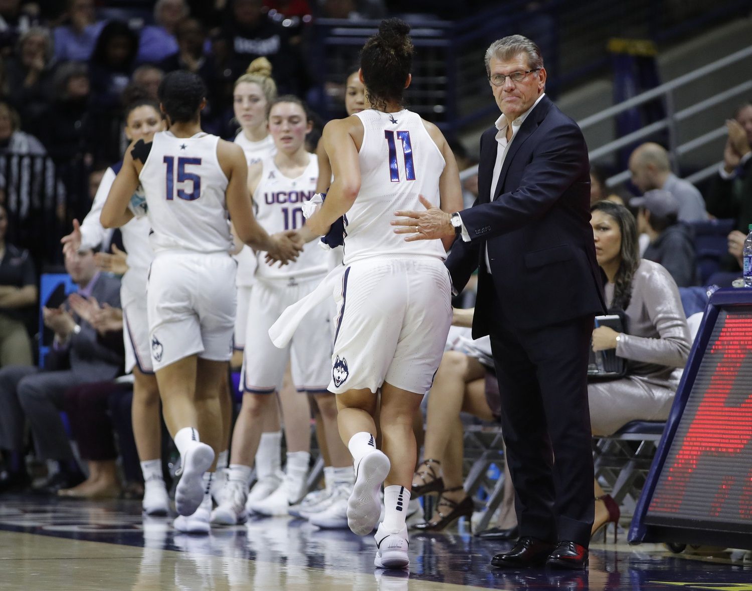 Connecticut Huskies head coach Geno Auriemma reacts to guard Kia Nurse (11) and forward Gabby Williams (15) as they head to the bench in the second half against the California Golden Bears at Harry A. Gampel Pavilion. UConn defeated the Golden Bears 82-47.