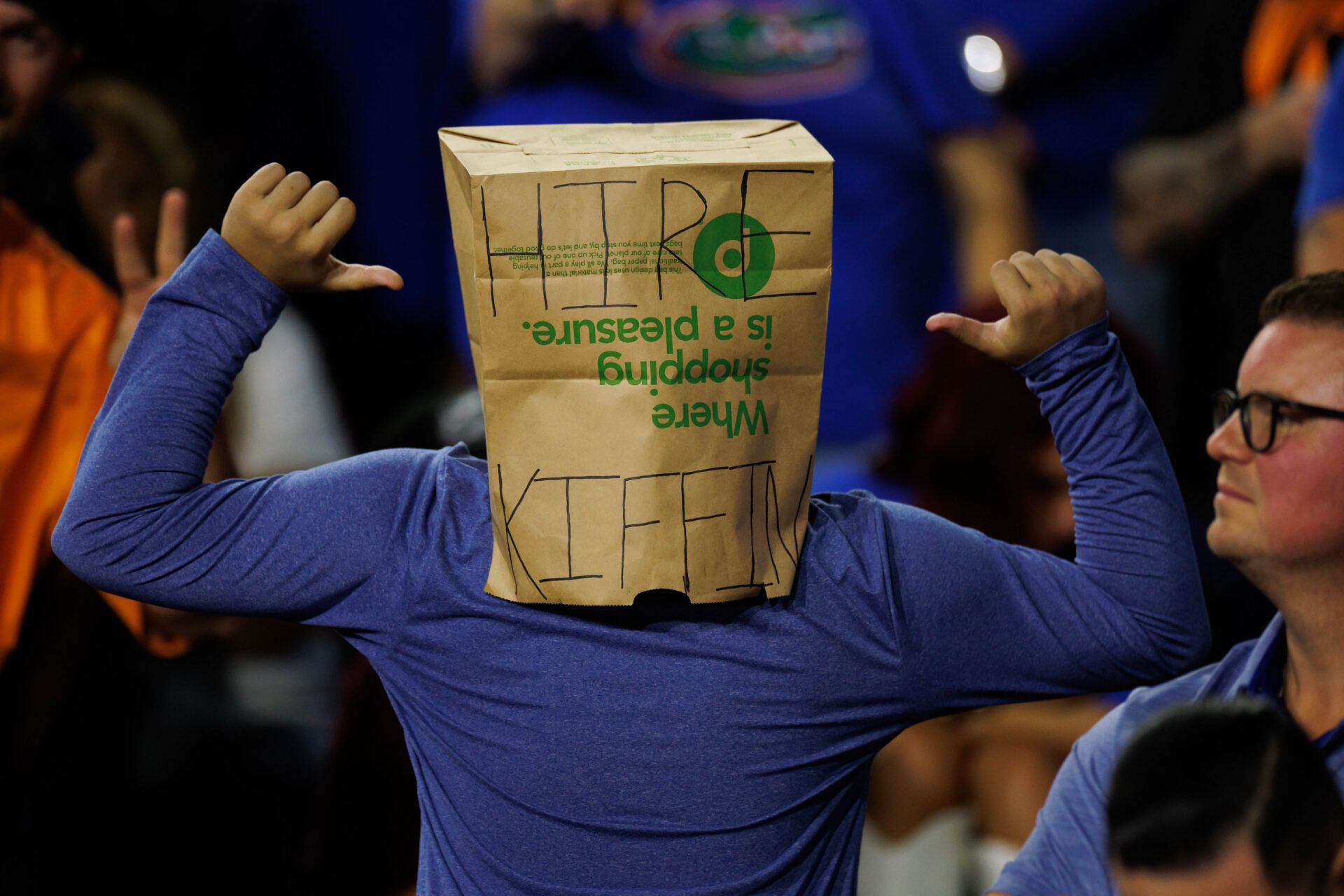 A Florida Gators fan wears a bag with the text Hire Lane Kiffin written on it against the Tennessee Volunteers during the second half at Ben Hill Griffin Stadium.