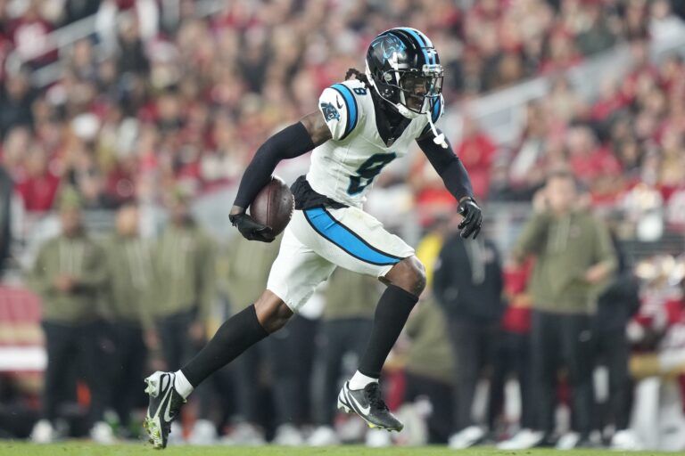 Carolina Panthers cornerback Jaycee Horn (8) catches an interception against the San Francisco 49ers during the first half at Levi's Stadium.