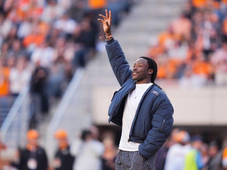 Former Tennessee and current New Orleans Saints running back Alvin Kamara is recognized on the field during the NCAA college football game between New Mexico State and Tennessee on November 15, 2025, in Knoxville, Tenn.