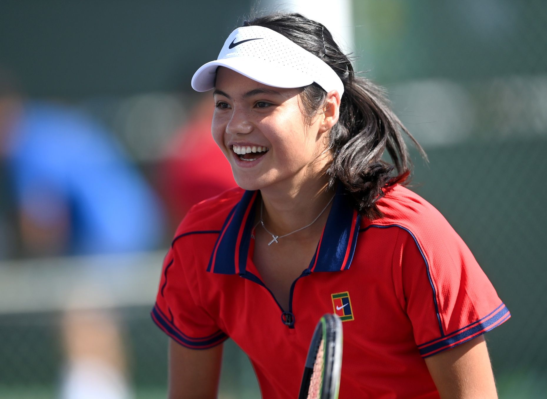 Emma Raducanu (GBR) reacts on the practice courts during day 2 of the BNP Paribas Open at the Indian Wells Tennis Garden.