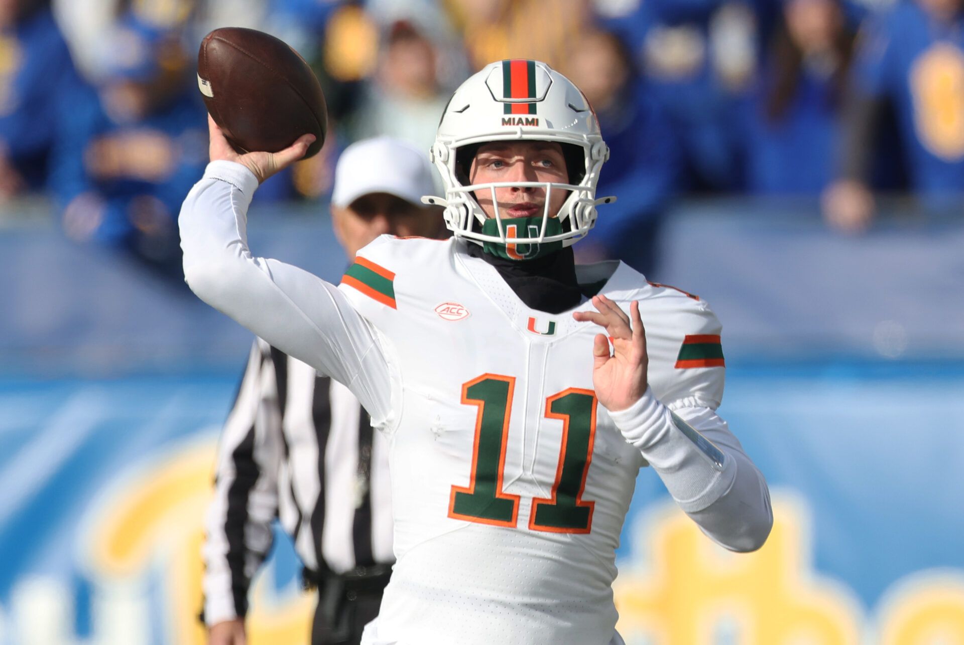 Miami Hurricanes quarterback Carson Beck (11) passes against the Pittsburgh Panthers during the first quarter at Acrisure Stadium.