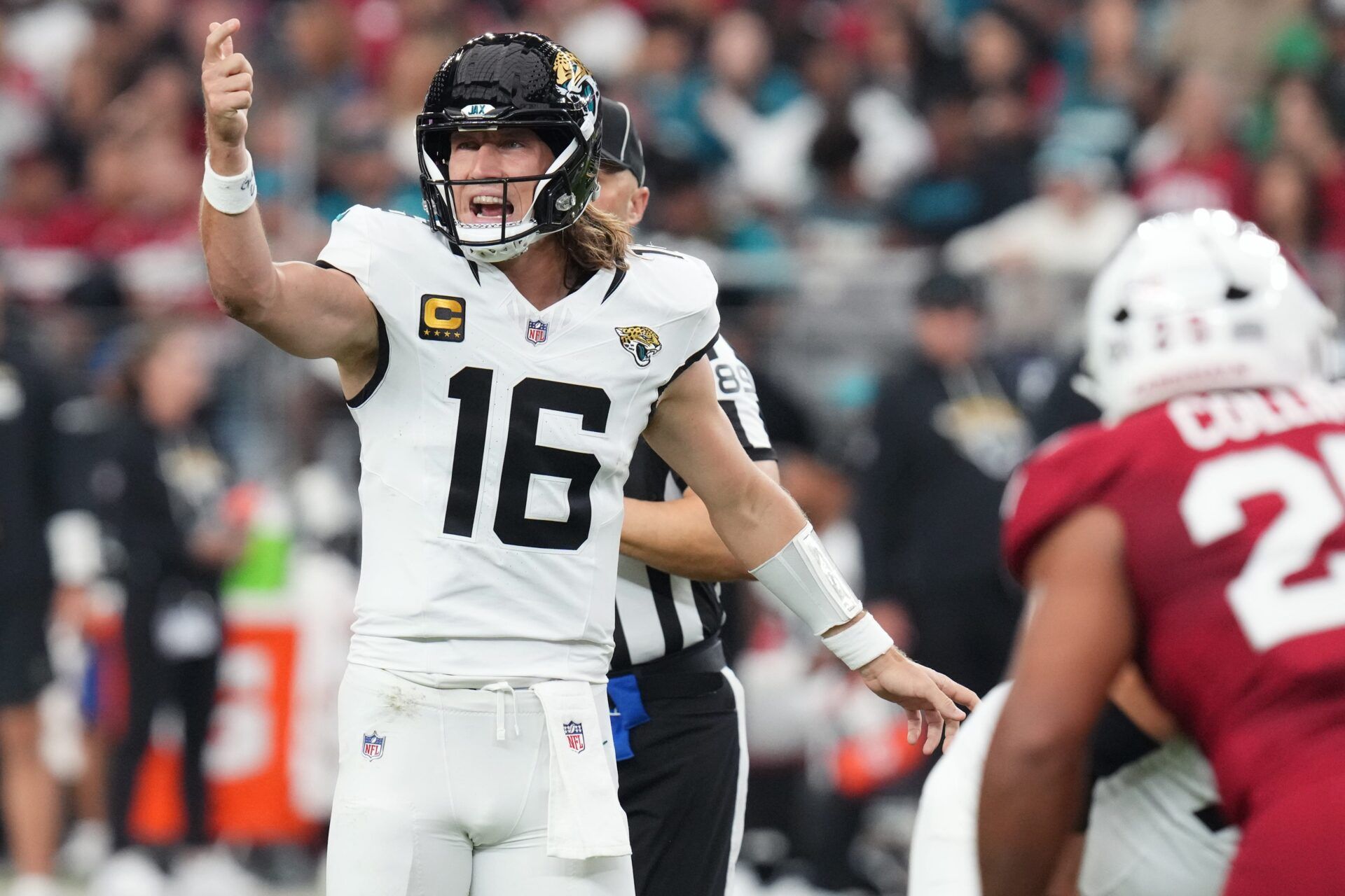 Jacksonville Jaguars quarterback Trevor Lawrence (16) calls out a play from the line of scrimmage against the Arizona Cardinals at State Farm Stadium on Nov. 23, 2025.