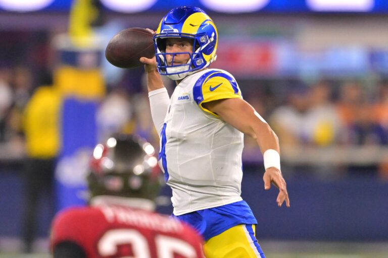 Los Angeles Rams quarterback Matthew Stafford (9) sets to pass against the Tampa Bay Buccaneers during the second half at SoFi Stadium.