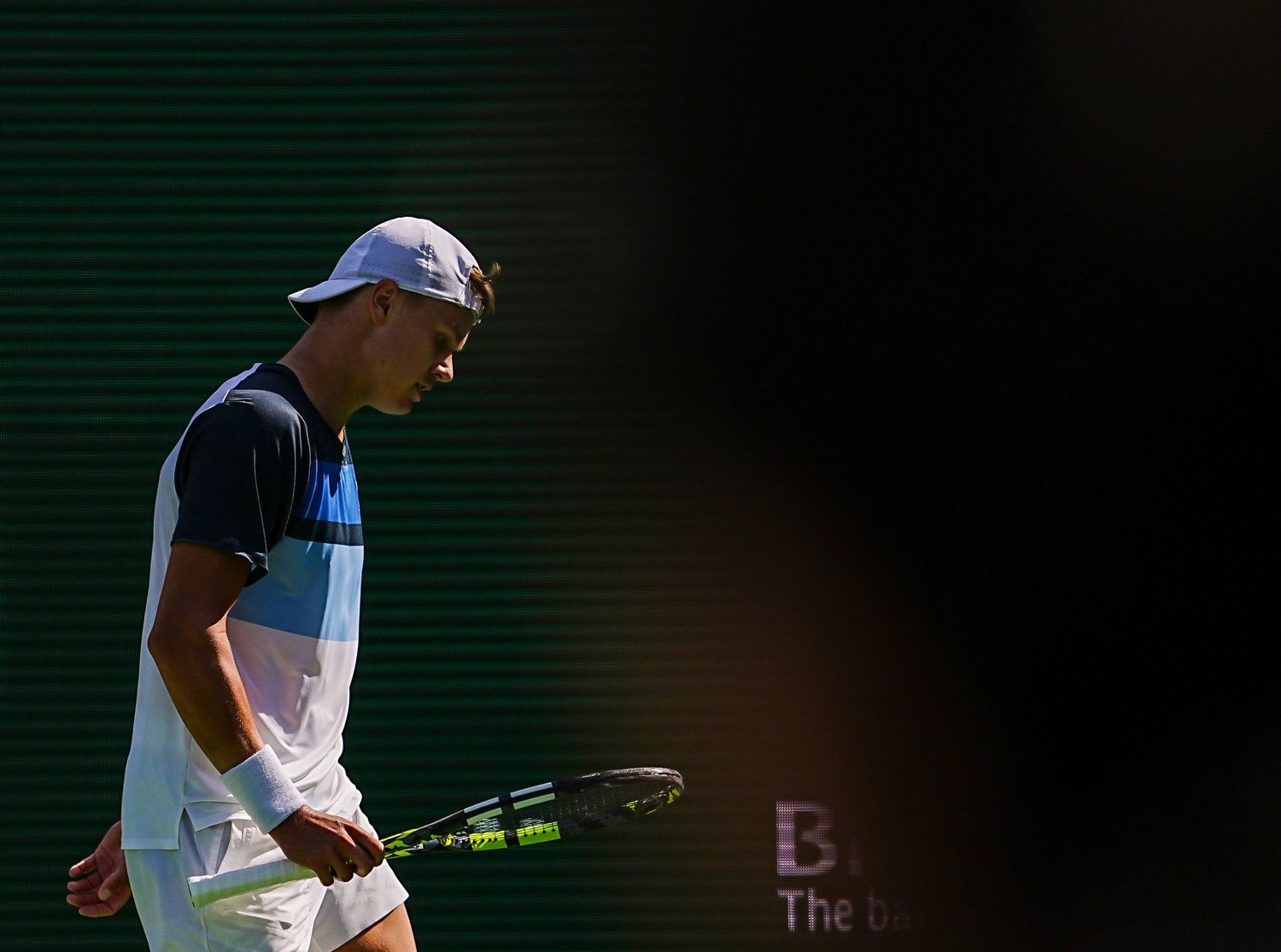 Holger Rune takes a breath before serving for match point against Daniil Medvedev during the ATP semifinals at the BNP Paribas Open in Indian Wells, Calif., Saturday, March 15, 2025.