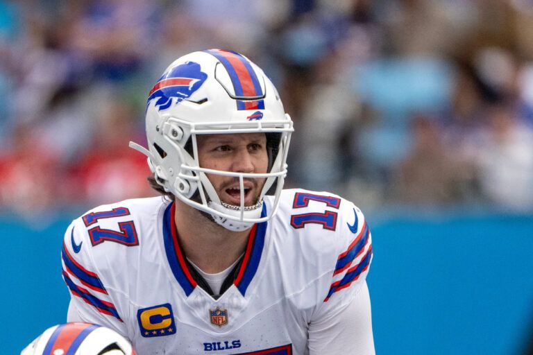 Buffalo Bills quarterback Josh Allen (17) at the line of scrimmage in the third quarter at Bank of America Stadium.
