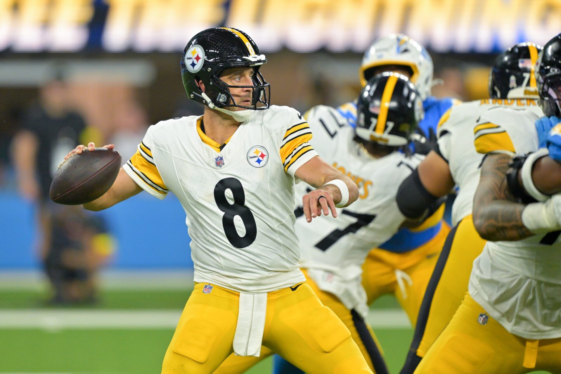 Pittsburgh Steelers quarterback Aaron Rodgers (8) passes the ball against the Los Angeles Chargers during the third quarter of the game at SoFi Stadium.