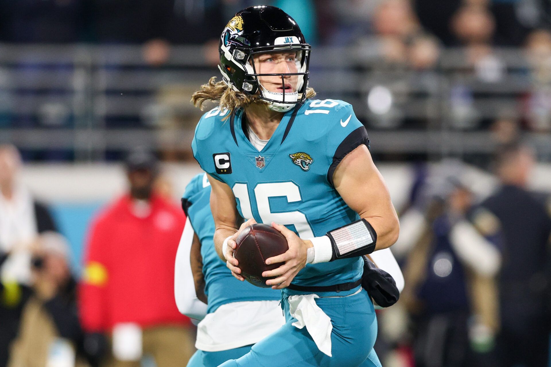 Jacksonville Jaguars quarterback Trevor Lawrence (16) drops back to pass against the Tennessee Titans at TIAA Bank Field.