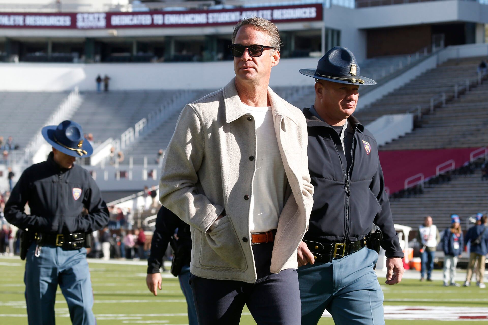 Mississippi Rebels head coach Lane Kiffin walks on field before the game against the Mississippi State Bulldogs at Davis Wade Stadium at Scott Field.