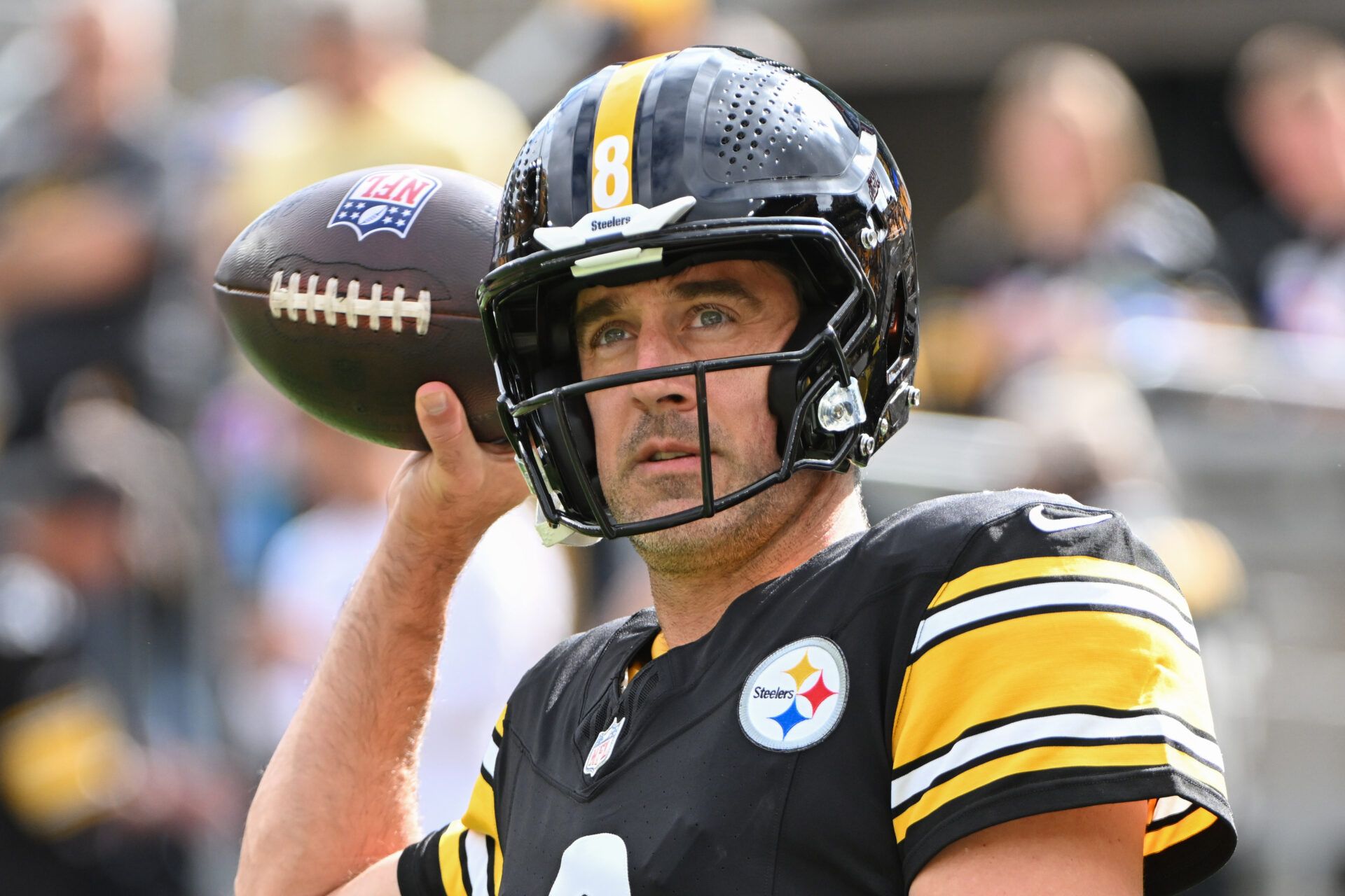 Pittsburgh Steelers quarterback Aaron Rodgers (8) warms up for a game against the Cleveland Browns at Acrisure Stadium.