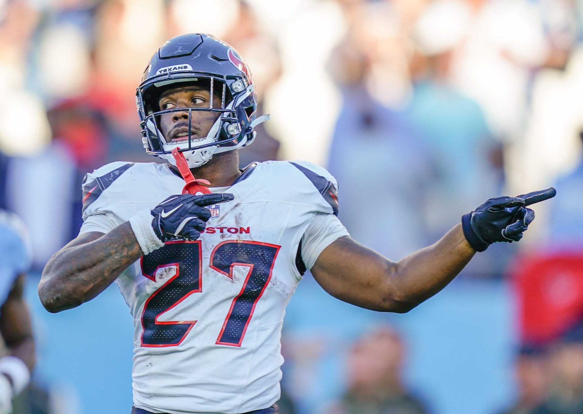 Houston Texans running back Woody Marks (27) signals a first down during the fourth quarter against the Tennessee Titans at Nissan Stadium in Nashville, Tenn., Sunday, Nov. 16, 2025.