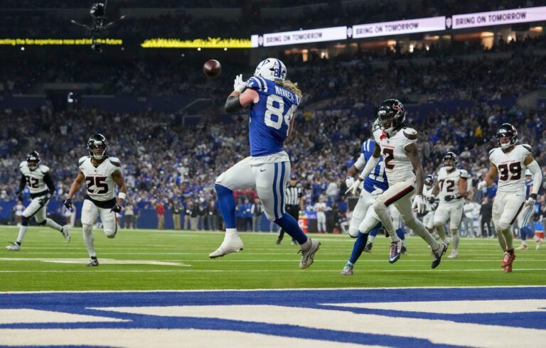 Indianapolis Colts tight end Tyler Warren (84) makes a catch for a touchdown Sunday, Nov. 30, 2025, during a game against the Houston Texans at Lucas Oil Stadium in Indianapolis.