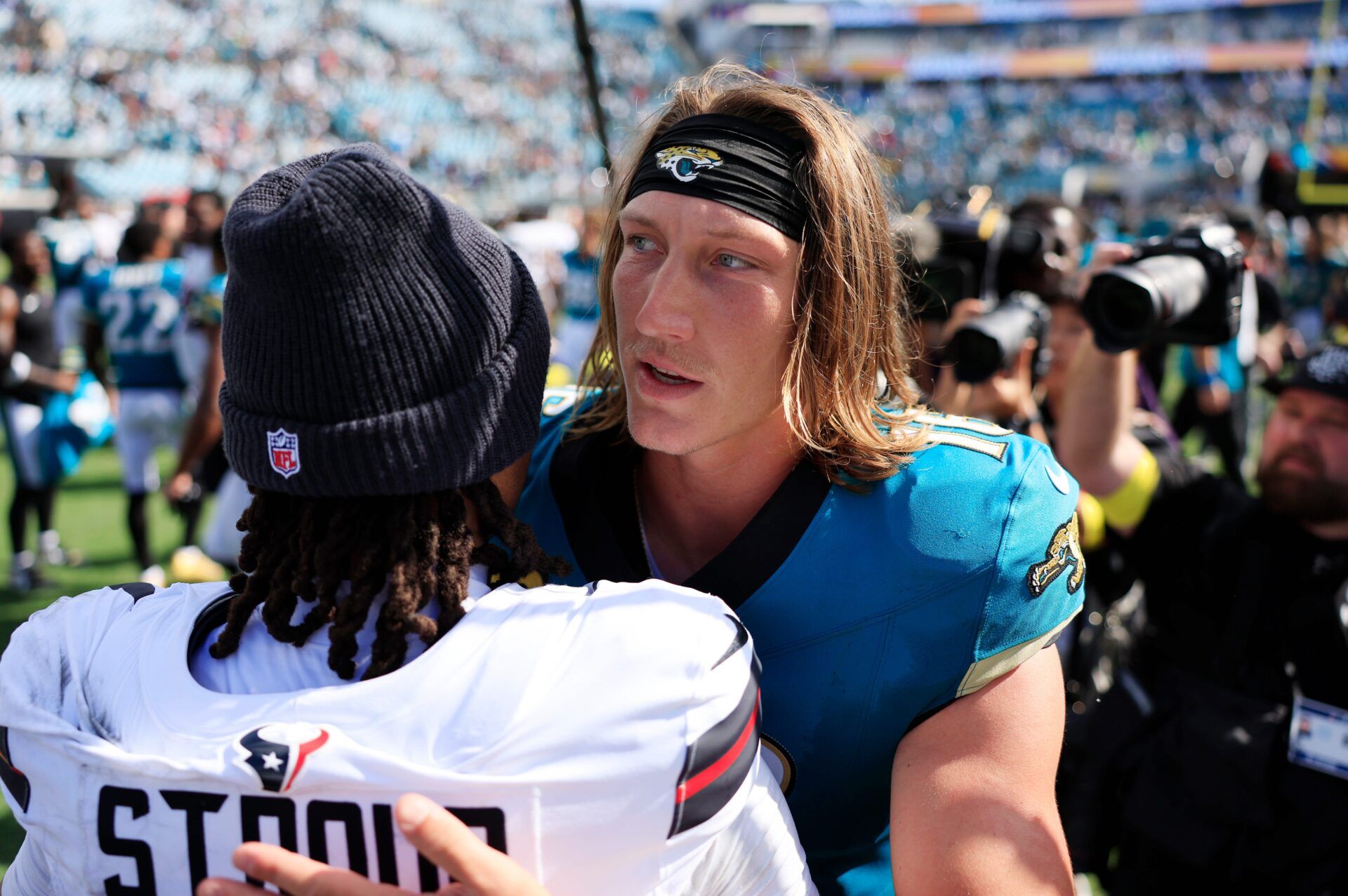 Jacksonville Jaguars quarterback Trevor Lawrence (16) greets Houston Texans quarterback CJ. Stroud (7) mid-field after the game of an NFL football matchup at EverBank Stadium, Sunday, Sept. 21, 2025, in Jacksonville, Fla. The Jaguars defeated the Texans 17-10. [Corey Perrine/Florida Times-Union]
