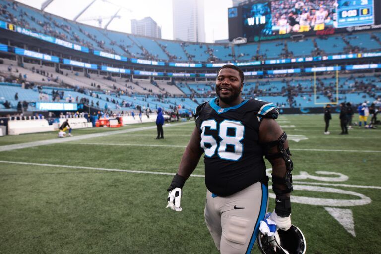Carolina Panthers guard Damien Lewis (68) looks on after the game against the Los Angeles Rams at Bank of America Stadium.