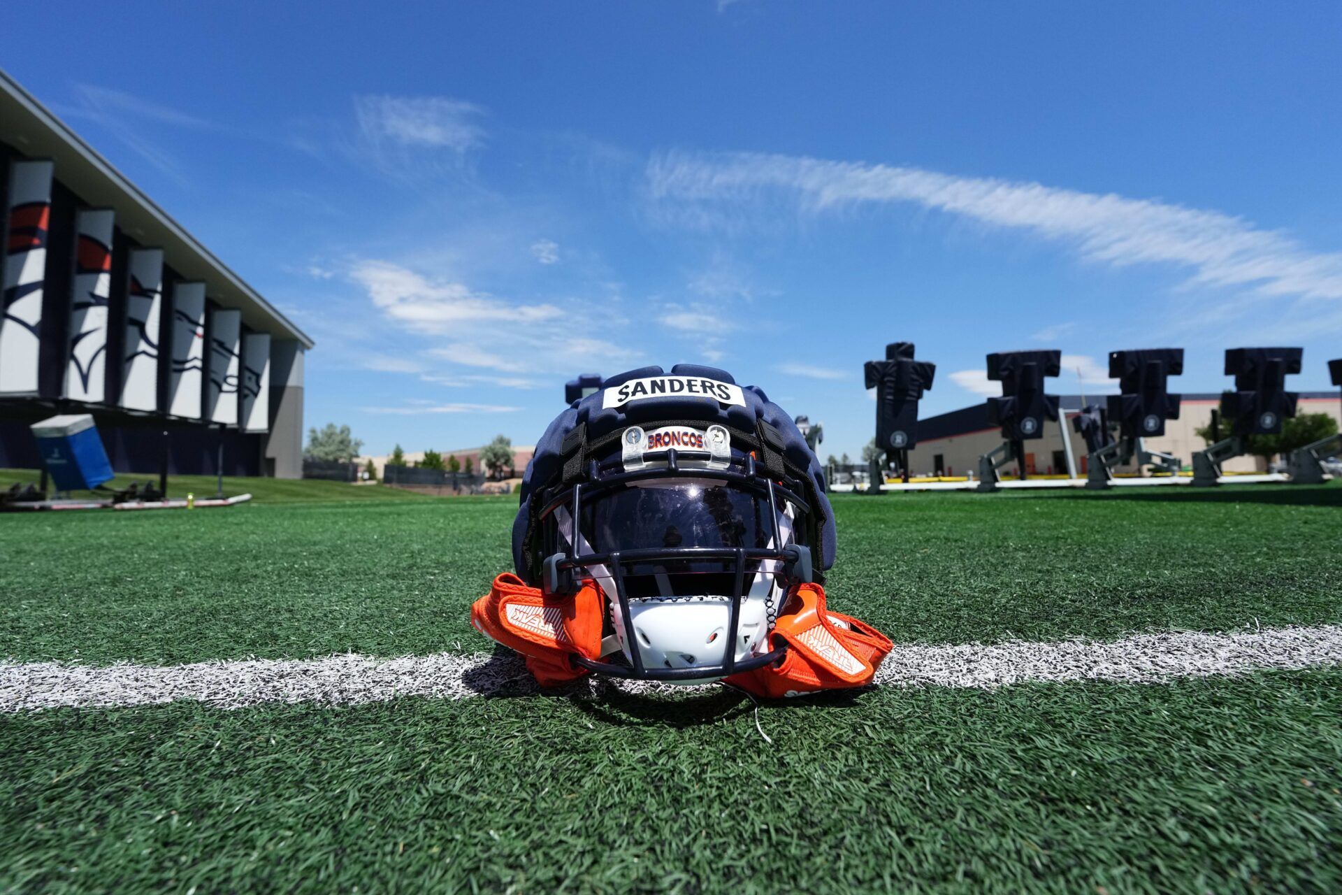 General view of the helmet of Denver Broncos linebacker Drew Sanders (41) following training camp the Centura Health Training Center.