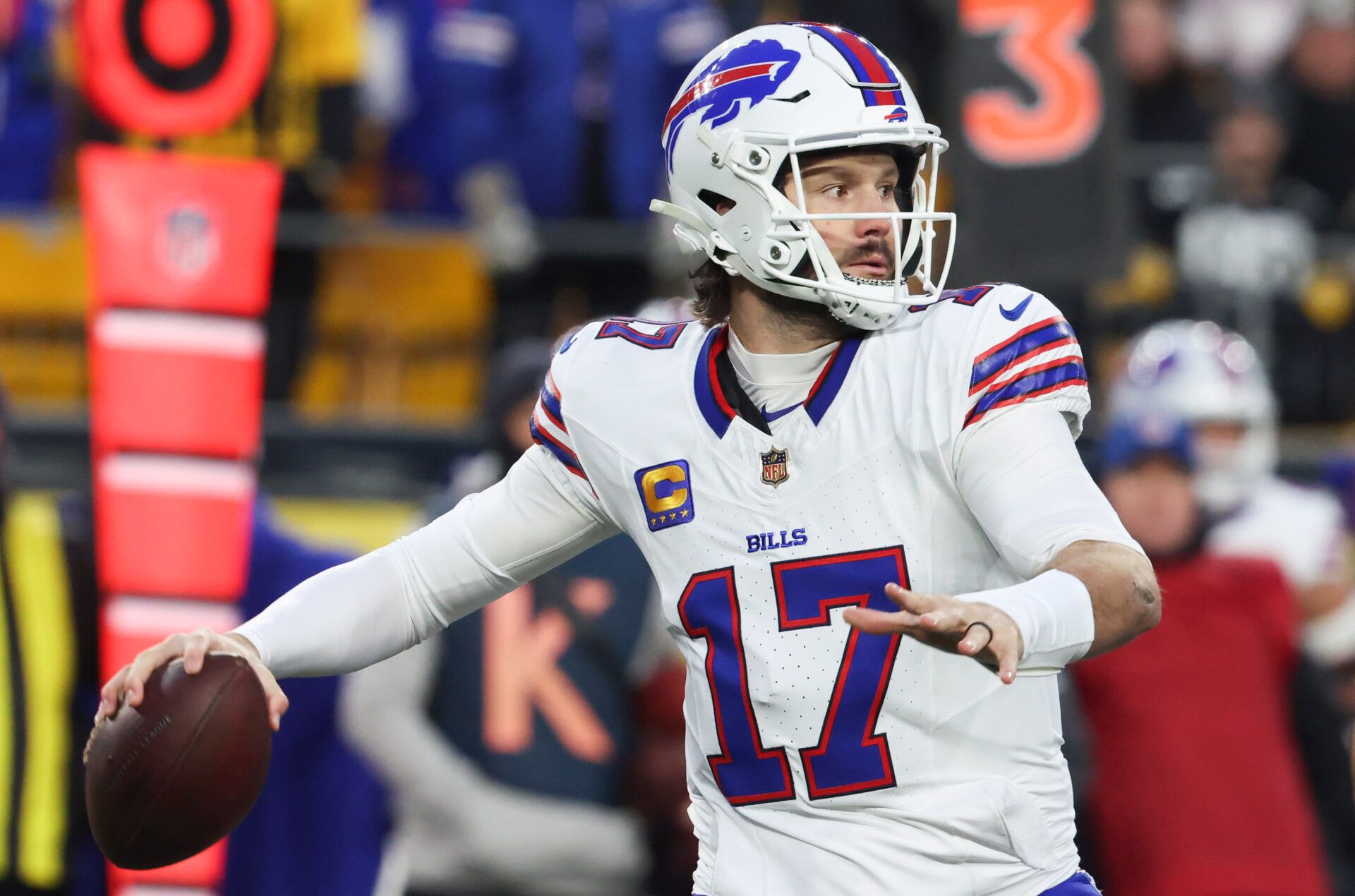 Buffalo Bills quarterback Josh Allen (17) looks to pass during the first quarter against the Pittsburgh Steelers at Acrisure Stadium.
